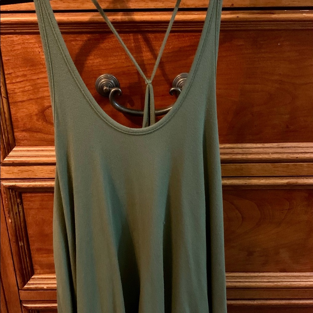 Altar’d State Top in Olive color with embroidered trim on bottom.